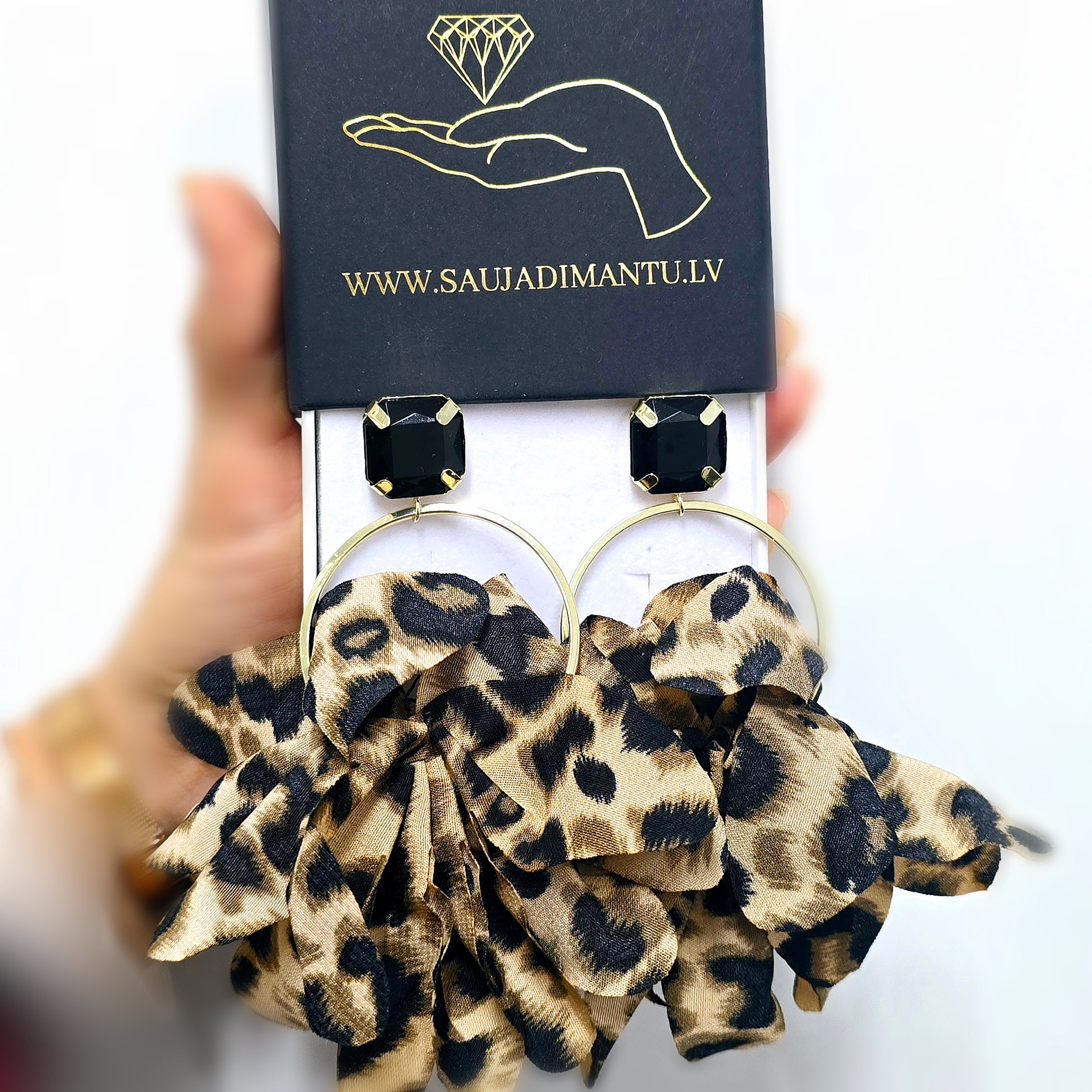 Auskari "Big Leopard"