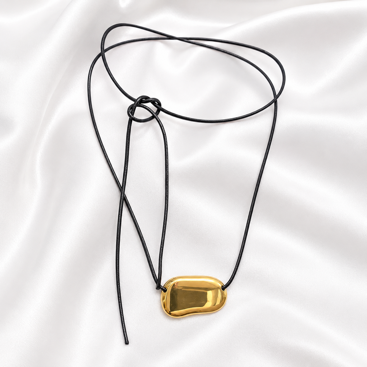 Kaklarota Sculptural Gold Pebble Cord