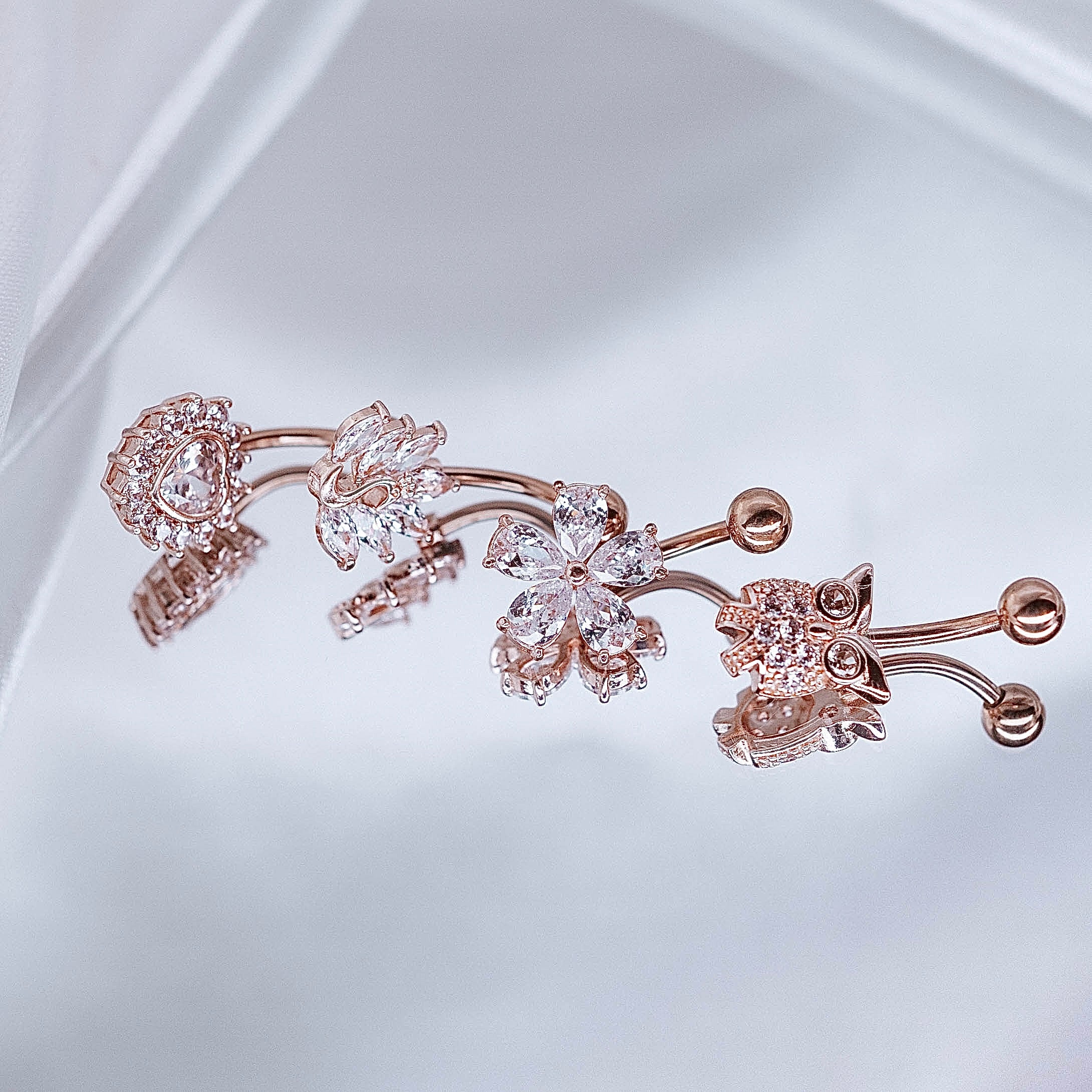 Nabas pīrsings "Sirds, gulbis, zieds vai pūce"