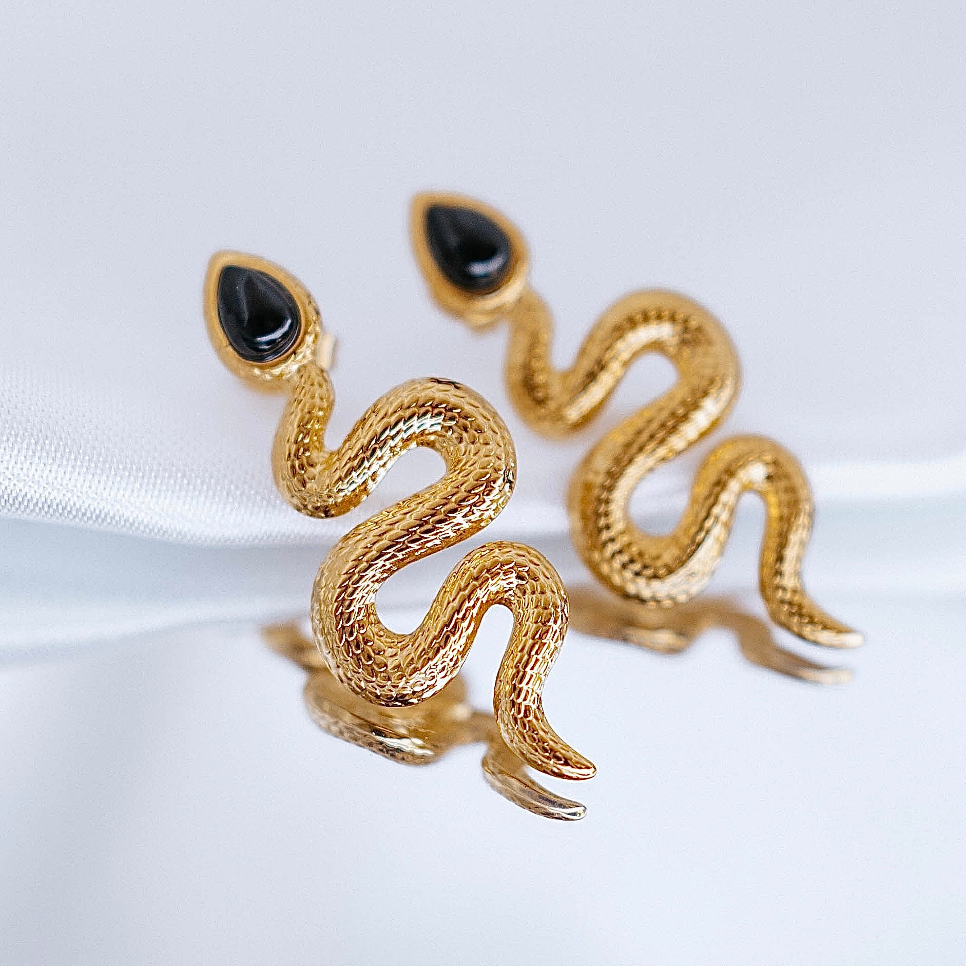 Auskari "Melnā čūska"