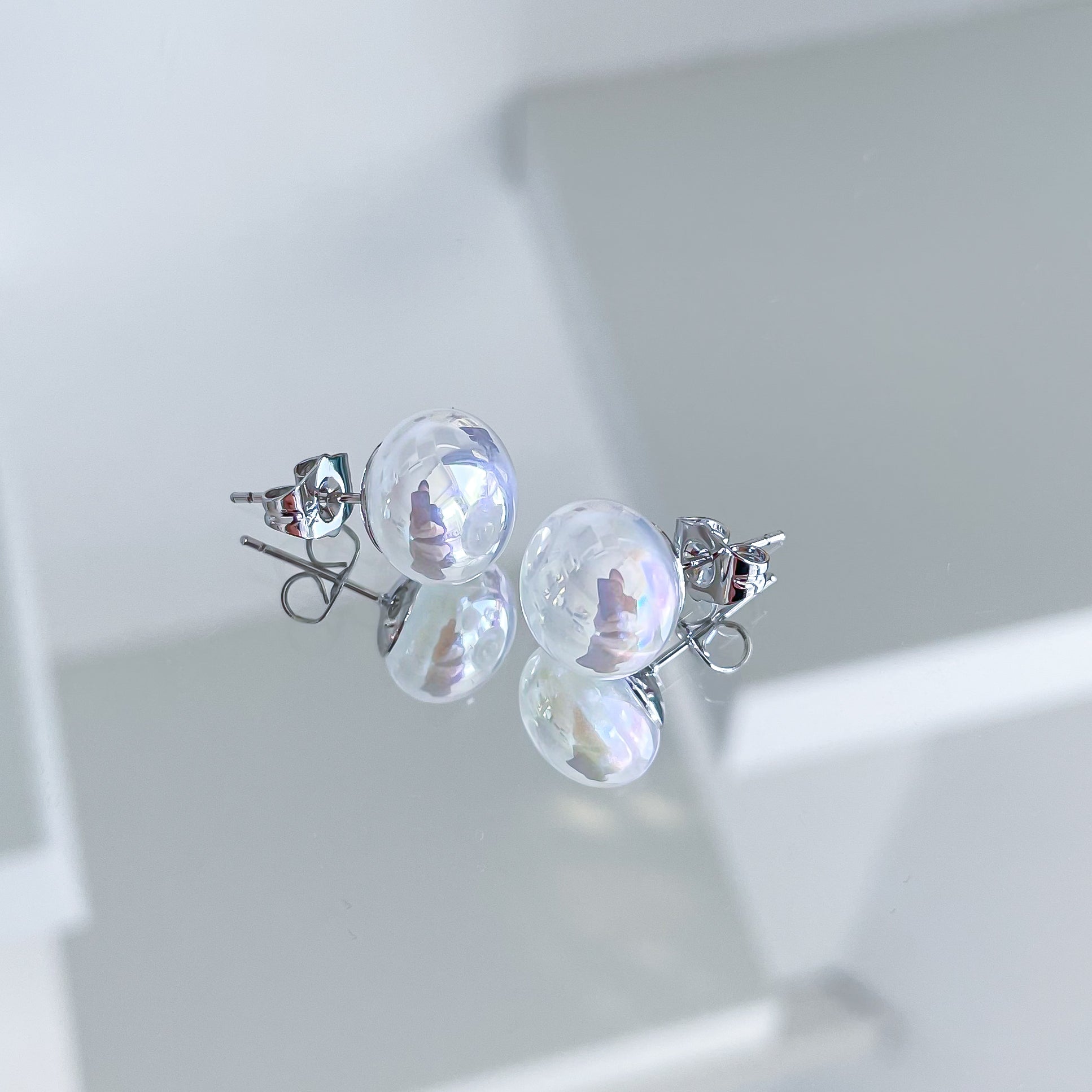 Auskari "Pērles atspulgā"