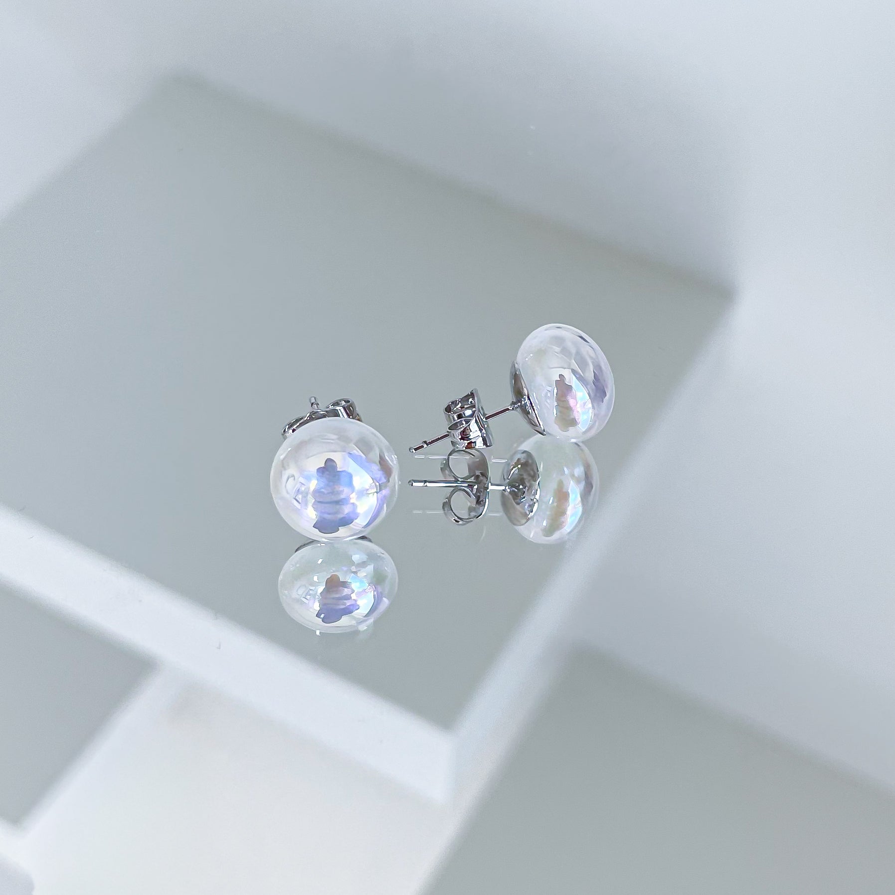 Auskari "Pērles atspulgā"