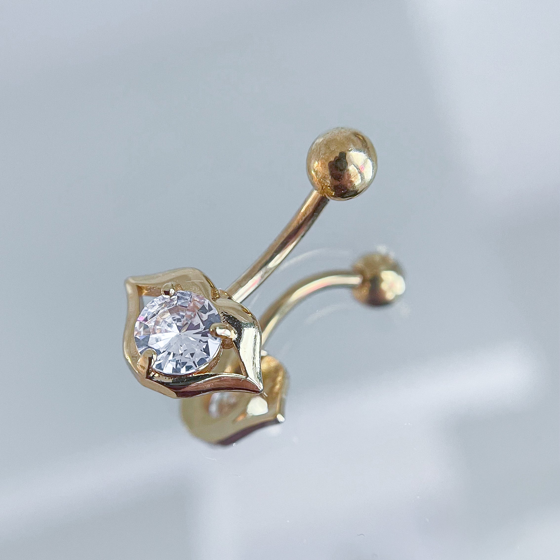 Nabas pīrsings "Bučiņa"