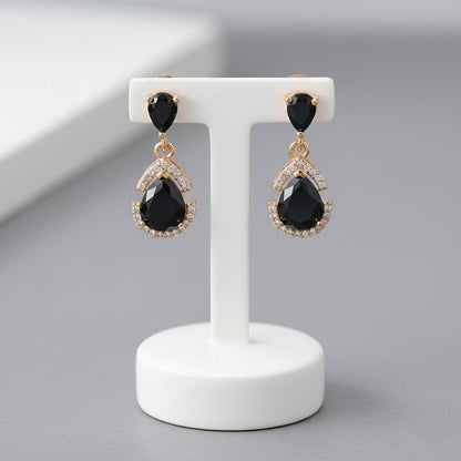 Auskari "Nokarenā melnā lāsīte"