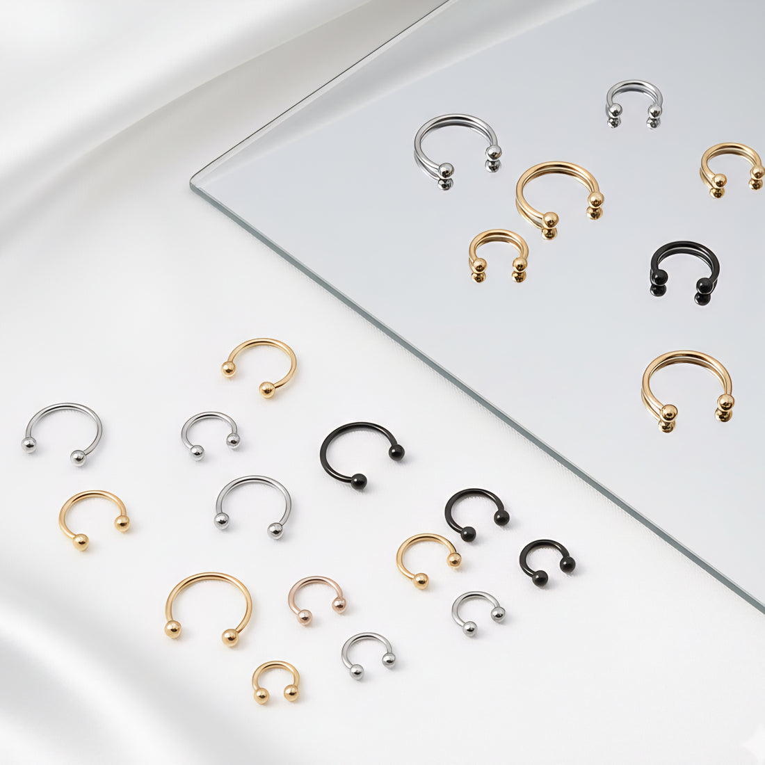 Pīrsings degunam "C ar bumbiņu" ausij, lūpai, uzacij