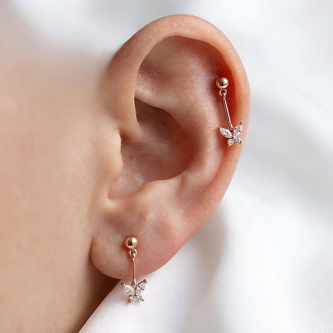 Pīrsings ausij "Nokarens taurentiņš"