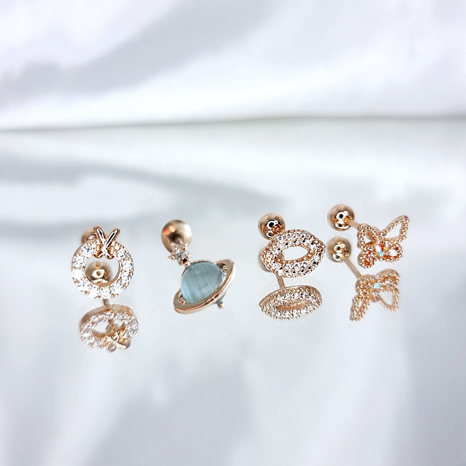 Pīrsings &quot;Round, world, kiss, butterfly&quot;