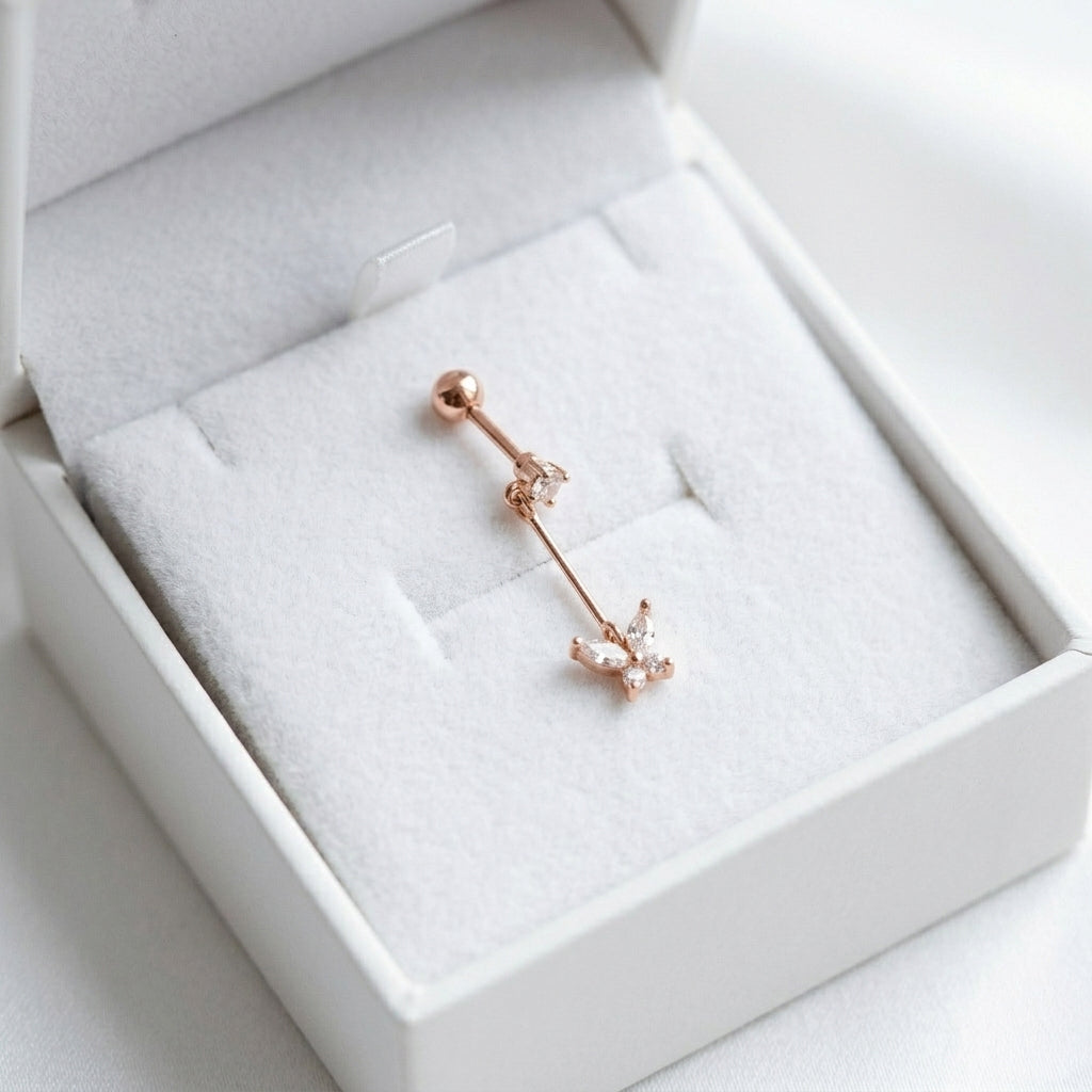 Pīrsings ausij "Nokarens taurentiņš"